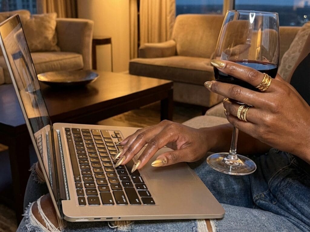 close up image of a woman hands typing on her laptop